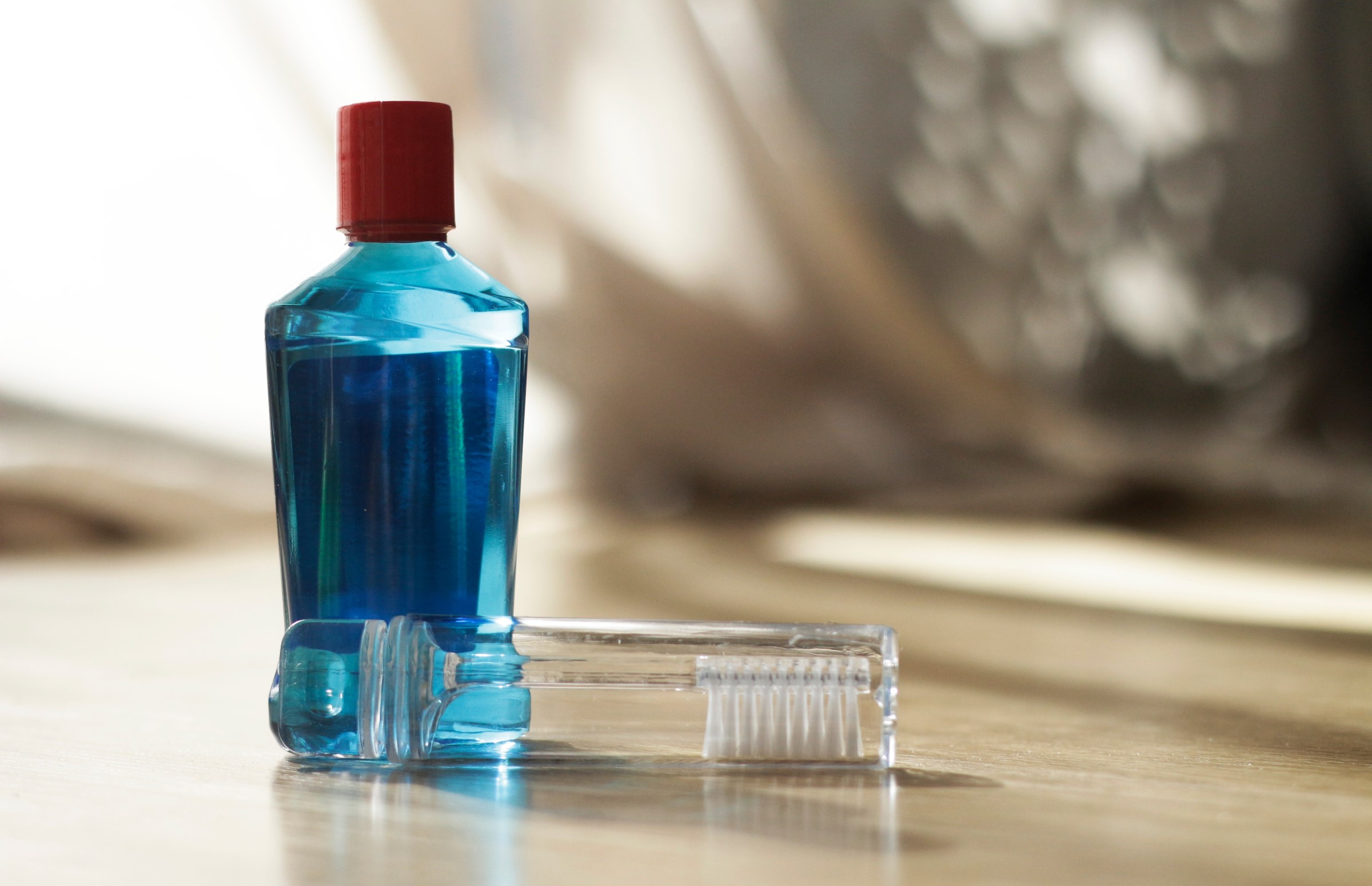 fluoride mouthwash and toothbrush